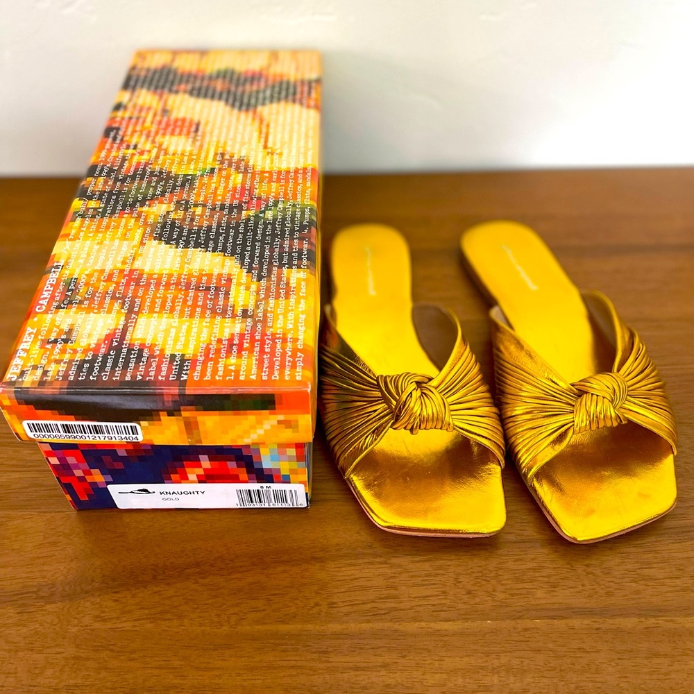 Jeffrey Campbell “Knaughty” flats in metallic gold.